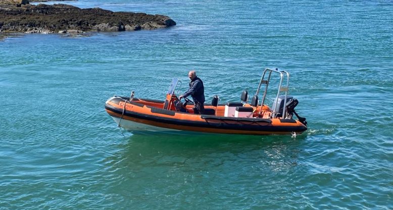 Picture of a man on a speedboat